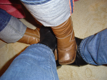 Another pic of some footsie in ankle boots with a friend!